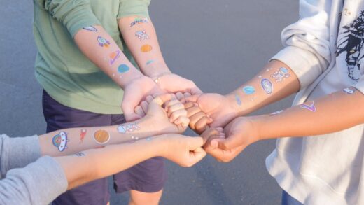 Children with Temporary Tattoos on their Arms